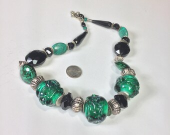 Emerald green necklace with lampwork glass, crystals, malachite and sterling silver findings. Emerald wedding