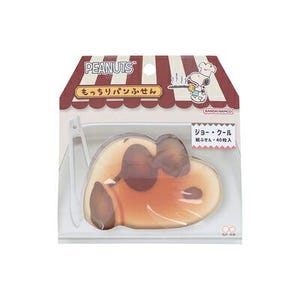 Könnte beinhalten: Eine Packung Haftnotizen im Peanuts-Design in Form von Snoopy's Gesicht. Die Verpackung zeigt ein rot-weiß gestreiftes Markisendesign mit dem Peanuts-Logo und japanischem Text. Die Notizen befinden sich in einem transparenten Kunststoffbehälter.