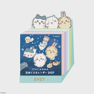 May include: A 2027 daily tear-off desk calendar featuring Chiikawa characters on a dark blue background with stars. The top displays three cartoon figures, while the front cover includes the text "CHIIKAWA" and "日めくりカレンダー 2027".