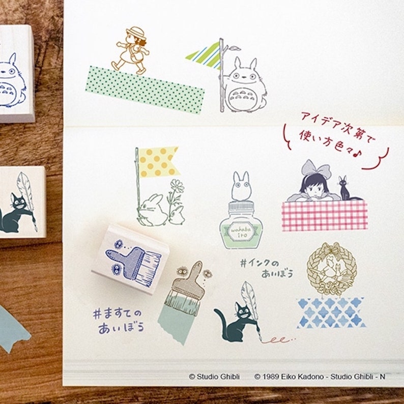 May include: A set of 10 rubber stamps featuring characters from Studio Ghibli films. The stamps are made of wood and have a variety of designs, including Totoro, Kiki's Delivery Service, and My Neighbor Totoro. The stamps are perfect for adding a touch of whimsy to your crafting projects.