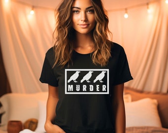 Un asesinato de cuervos en un divertido regalo cómodo y divertido camiseta de manga corta unisex