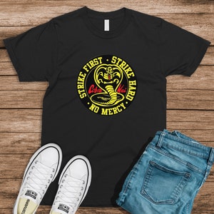 Cobra Kai Karate Dojo Tees, Netflix Karate Kid Show TV Shirts, strike first, strike hard, no mercy karate fanatic shirts, karate kid sequel