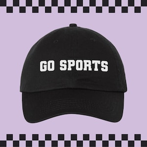 May include: A black baseball cap with a white embroidered design that says "GO SPORTS".