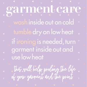 May include: A purple background with white text that reads "garment care" and instructions for washing, drying, and ironing a garment. The text says to wash inside out on cold, tumble dry on low heat, and if ironing is needed, turn garment inside out and use low heat. The text also says "this will help prolong the life of your garment and the print."