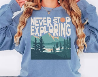 N'arrêtez jamais d'explorer les couleurs du confort : sweat-shirt ras du cou couleurs, sweat-shirt fille nature, sweat-shirt ras du cou graphique