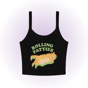 May include: Black tank top with a green marijuana leaf and the text "Rolling Fatties" in green letters. A cartoon orange cat is lying on a green leaf.