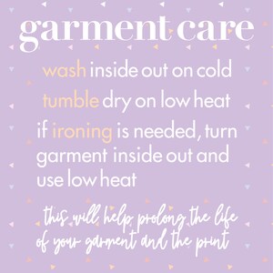 May include: A purple background with white text that reads "garment care" and instructions for washing, drying, and ironing a garment. The text says to wash inside out on cold, tumble dry on low heat, and if ironing is needed, turn garment inside out and use low heat. The text also says "this will help prolong the life of your garment and the print."