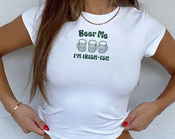May include: White t-shirt with a green graphic of three beer mugs and the text "Beer Me I'm Irish-ish".