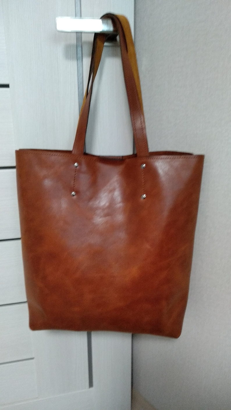 large leather bag with eagle print