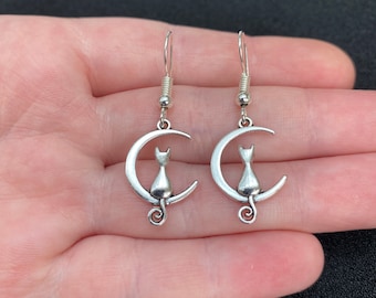 Silver dangle/ drop earrings with cat on the moon charms, cat earrings, moon earrings, cat on the moon earrings