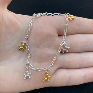 Sterling Silver Balloon Dog Charm Bracelet: Gold Plated Accents