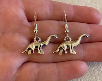 Silver dangle/ drop earrings with silver dinosaur charms, silver dinosaur earrings, stocking filler, secret Santa gift