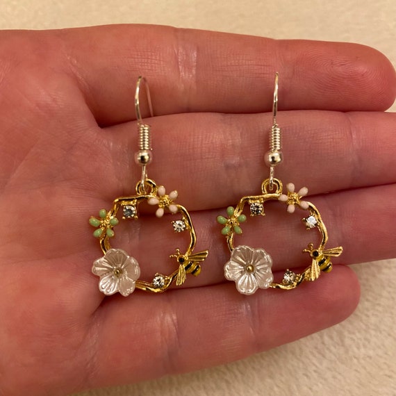 Dangling earrings with silver rhinestones