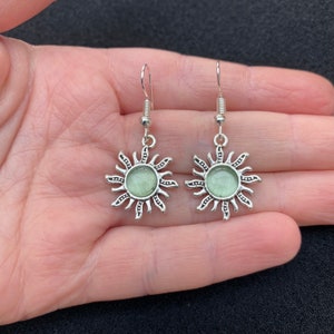 Silver dangle/ drop earrings with green sun charms, sun earrings, sun jewellery