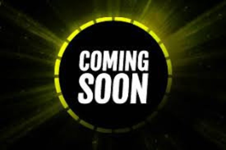 May include: A black circle with a yellow border and the text "COMING SOON" in white.
