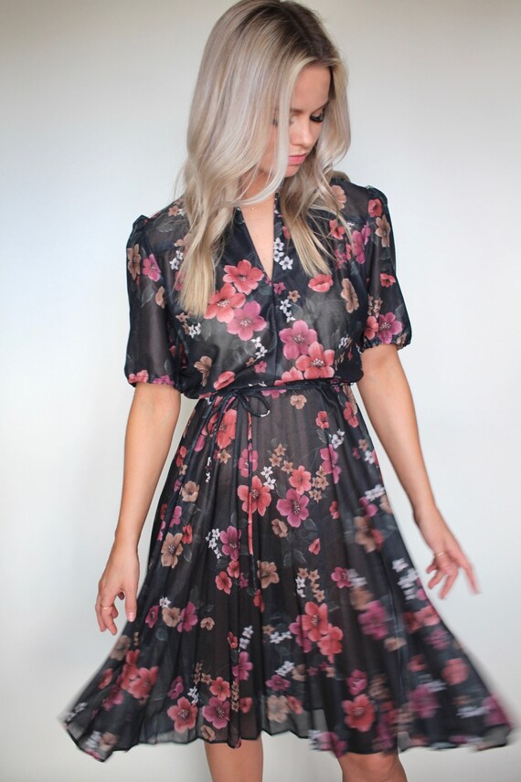 pink dress with black flowers