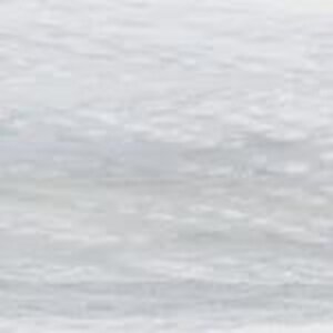 May include: A close-up view of a white, textured surface. The surface appears to have a subtle, rippled pattern, creating a sense of depth and visual interest. The lighting is soft, highlighting the texture and variations in tone.