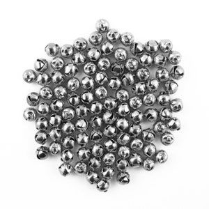 May include: A large pile of silver jingle bells. The bells are small and round with a small opening at the top.