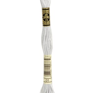 May include: A white DMC embroidery floss skein with a gold label that reads "DMC 25 8m (8.7 Yds)" and a barcode. The skein is labeled with the number "01".