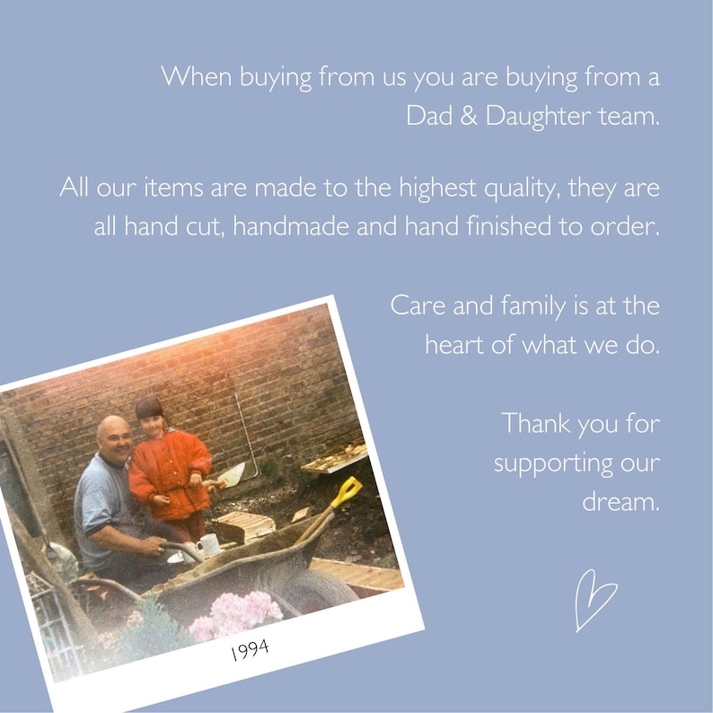 May include: A black and white photo of a father and daughter in a garden. The father is wearing a blue shirt and the daughter is wearing a red jacket. They are standing next to a wheelbarrow. The photo is dated 1994.