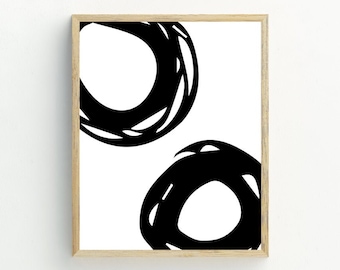 May include: Black and white abstract art print with two overlapping circles in a framed poster.