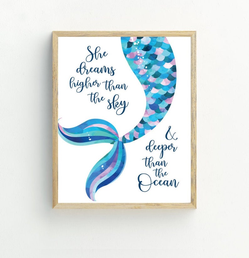 May include: A watercolor illustration of a mermaid tail with the text "She dreams higher than the sky & deeper than the ocean".