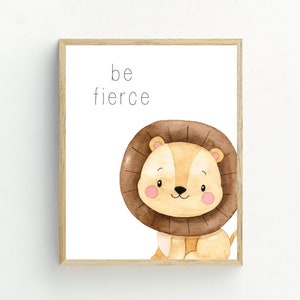 May include: A watercolour illustration of a cute lion with the text "be fierce" printed above it. The lion is brown and yellow with a brown mane. The background is white.