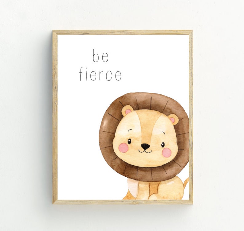 May include: A watercolour illustration of a cute lion with the text "be fierce" printed above it. The lion is brown and yellow with a brown mane. The background is white.