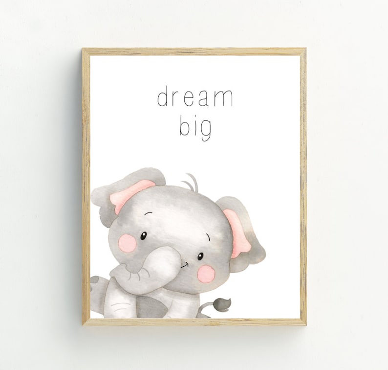 May include: A watercolour illustration of a cute grey elephant with pink ears, looking at the viewer. The text "dream big" is written above the elephant.