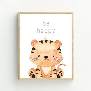 May include: A printable art print featuring a cute cartoon tiger with the text "be happy" in black.