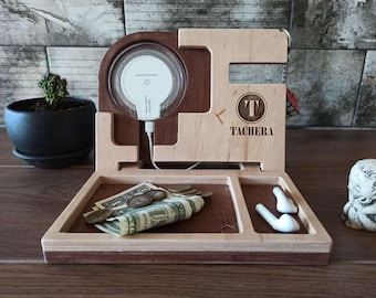 Wooden cell phone dock with space for wireless charging and storage. Free personalization.