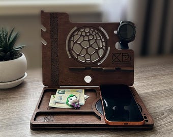 Base de madera con espacio de carga Qi para teléfono, reloj y AirPods.