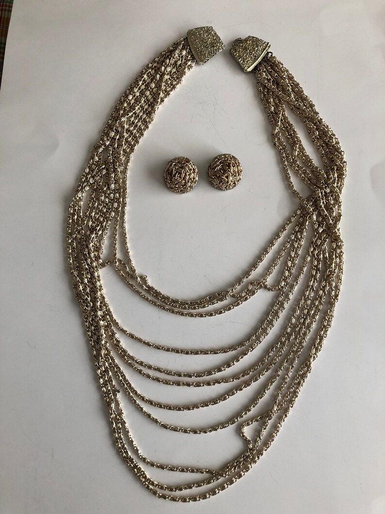 Vintage Gold Multi-strand Waterfall Necklace and matching Clip on Earrings21 12 Earrings are 1 RoundGreat Condition#VB40