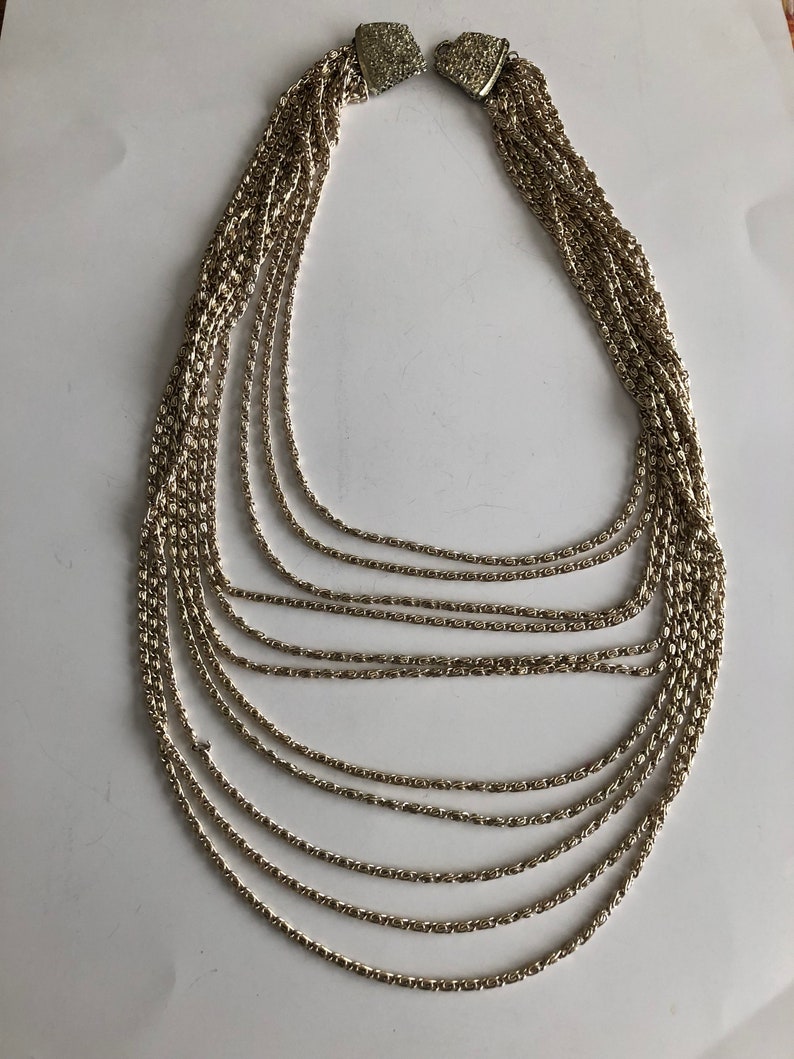 Vintage Gold Multi-strand Waterfall Necklace and matching Clip on Earrings21 12 Earrings are 1 RoundGreat Condition#VB40