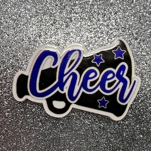 May include: A black and white megaphone with the word "Cheer" in blue lettering and blue stars.