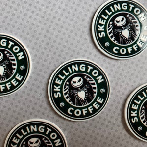 May include: Five round stickers with a black and white design of a skeleton character with a heart in its hand. The text "SKELINGTON COFFEE" is written in a circle around the character.