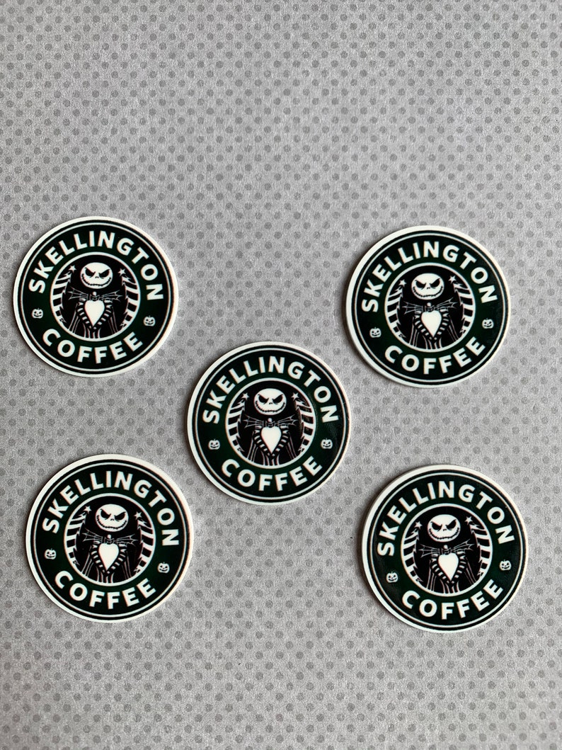 May include: Five black and white round stickers with the words "SKellington Coffee" in a circle around a black and white image of Jack Skellington from the Nightmare Before Christmas movie.