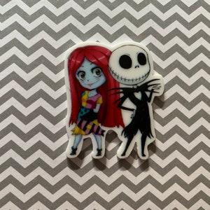 May include: A white background with a cartoon image of Jack Skellington and Sally from the Nightmare Before Christmas. Jack is wearing a black suit and Sally is wearing a patchwork dress.