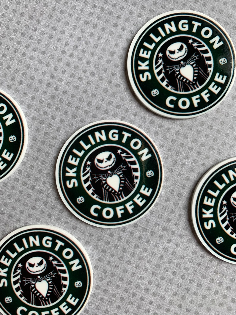 May include: Four black and white round stickers with the text "SKellington Coffee" and a cartoon image of Jack Skellington from the Nightmare Before Christmas.