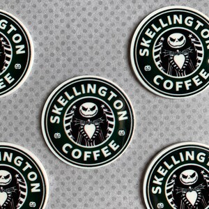 May include: Four black and white round stickers with the text "SKellington Coffee" and a cartoon image of Jack Skellington from the Nightmare Before Christmas.