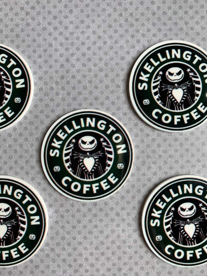 May include: Four black and white round stickers with the text "SKellington Coffee" and a cartoon image of Jack Skellington from the Nightmare Before Christmas.