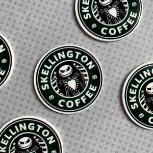 May include: Four round stickers with a black and white illustration of Jack Skellington from The Nightmare Before Christmas. The stickers have a green background with the text "Skellington Coffee" in a white circle.