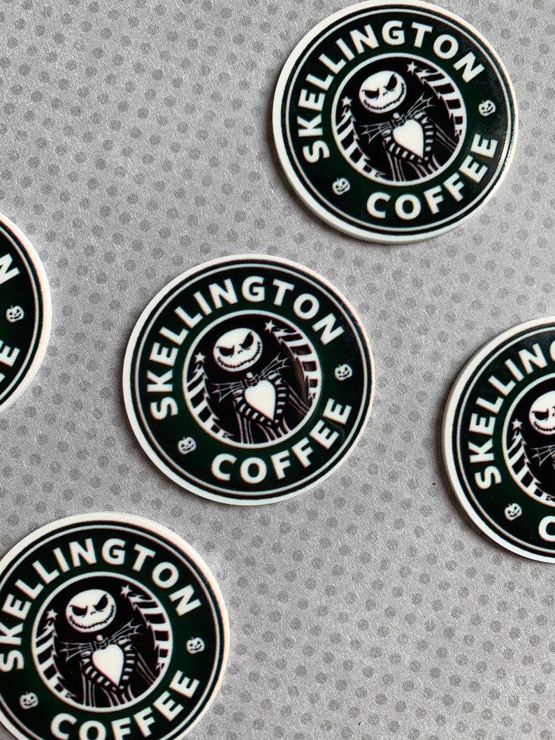May include: Four round stickers with a black and white illustration of Jack Skellington from The Nightmare Before Christmas. The stickers have a green background with the text "Skellington Coffee" in a white circle.