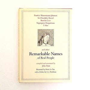 May include: A vintage book titled "Remarkable Names of Real People" with a cream-colored cover. The cover features a black and white illustration of a woman and lists names like "Positive Wassermann Johnson." The book is compiled and annotated by John Train.