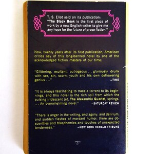 May include: The back cover of a vintage paperback book titled "The Black Book." The cover is black with white text and pink decorative elements. Quotes from critics and T.S. Eliot are featured.
