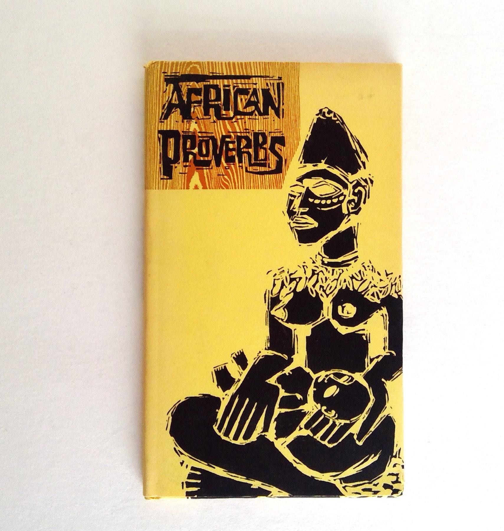 African Proverbs. Compiled by Charlotte & Wolf Leslau. Decorations by Jeff Hill. Peter Pauper Press, 1962. Hardcover with Dust Jacket.