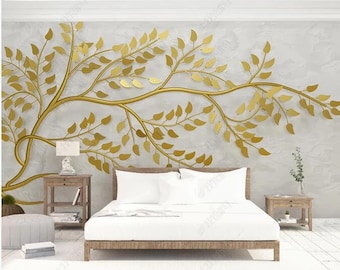 Puede incluir: Una cama blanca con un diseño de rama de metal dorado en la pared detrás de ella. La rama tiene hojas y es un diseño 3D.