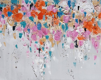 May include: Abstract floral painting with a textured surface. The artwork features a palette of orange, pink, blue, and gold against a light gray background. Splatter effects and brushstrokes create a dynamic, modern aesthetic. Signed by the artist.