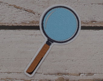 Magnifying glass / patch application