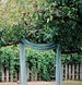 Rustic wedding arch Slate blue chiffon table runners Boho cheesecloth